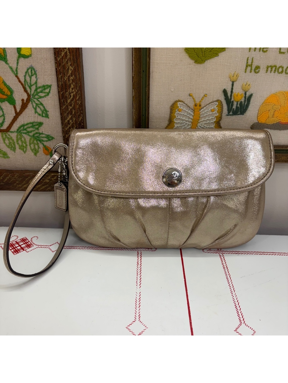 Coach gold/champagne large wristlet early 2010s